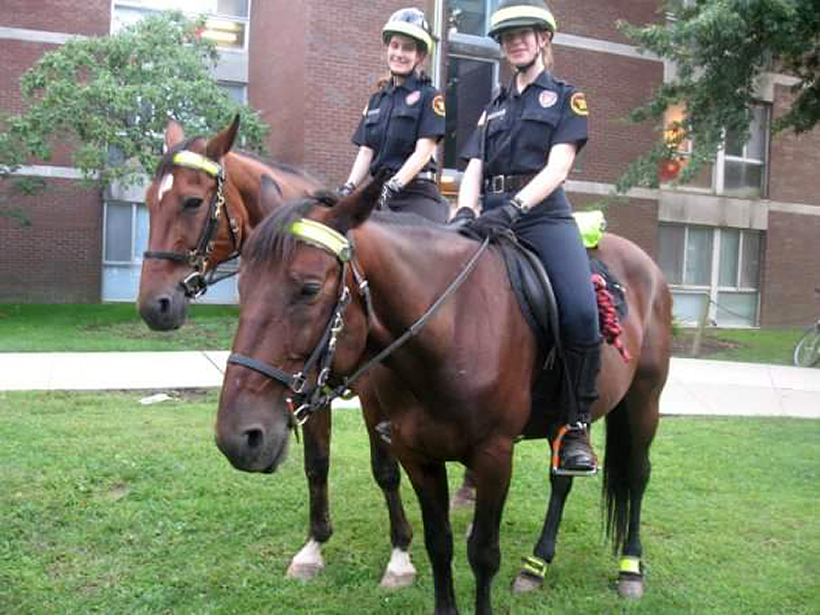 Two Mounted Patrol students on horses.